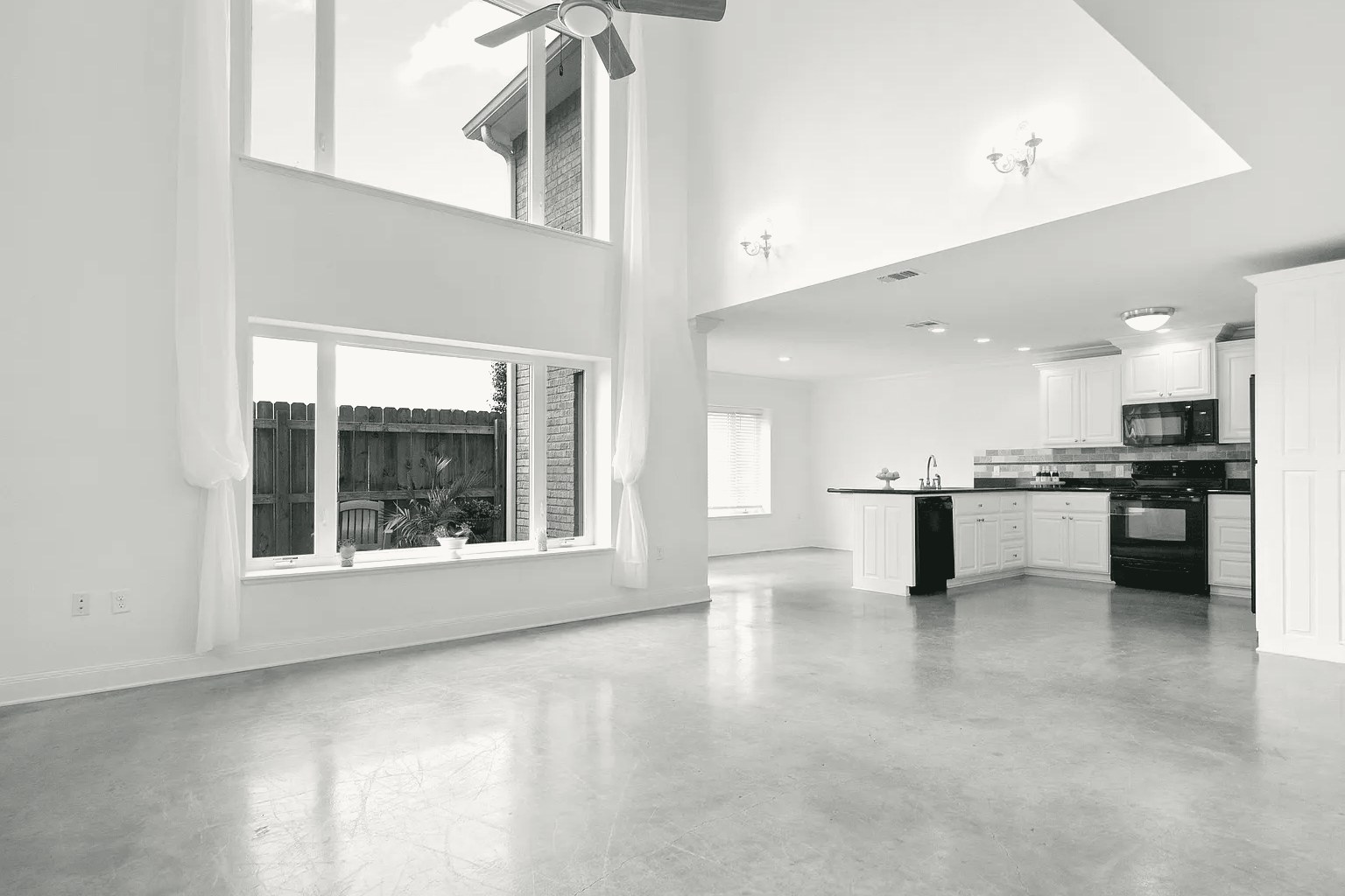 Living room with double-height windows