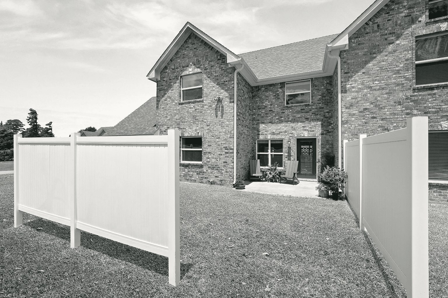 Fenced patio from the lawn